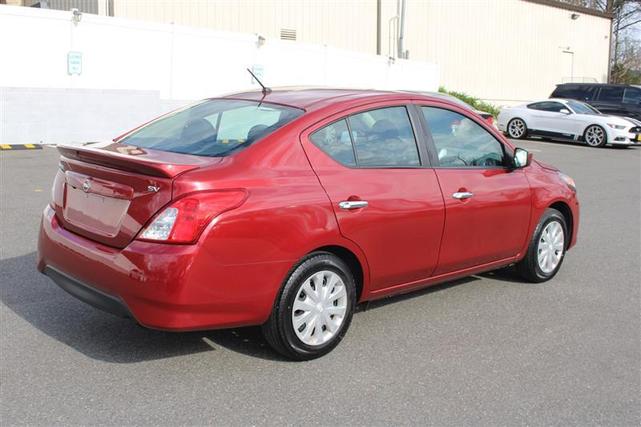 Photo of 2019 Cayenne Red Metallic Nissan Versa