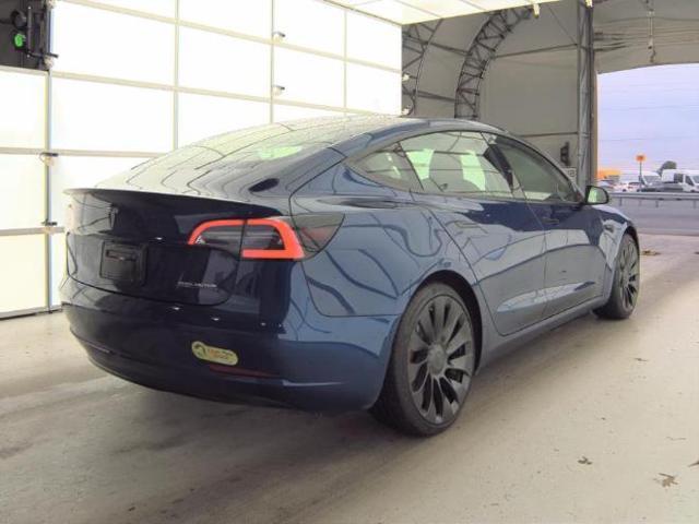 Photo of 2022 Deep Blue Metallic Tesla Model 3
