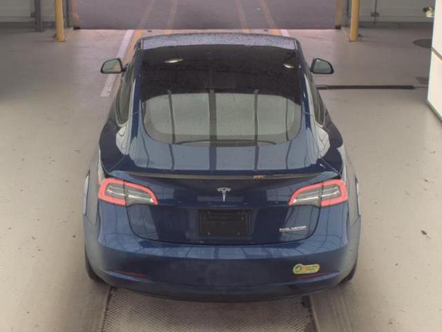Photo of 2022 Deep Blue Metallic Tesla Model 3