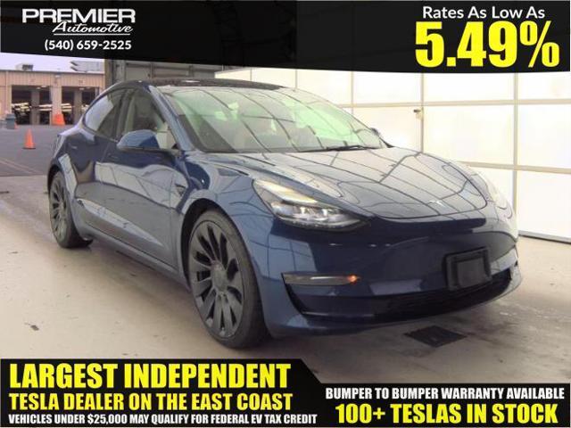 Photo of 2022 Deep Blue Metallic Tesla Model 3