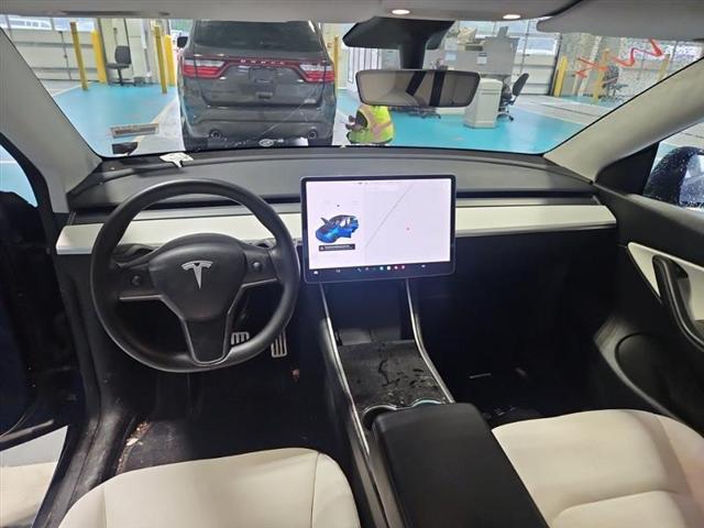 Photo of 2021 Deep Blue Metallic Tesla Model Y