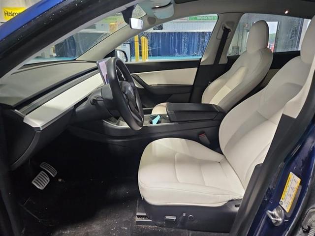 Photo of 2021 Deep Blue Metallic Tesla Model Y