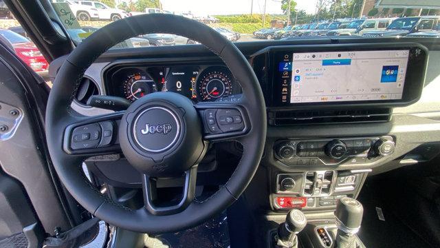 Photo of 2025 Granite Crystal Metallic Clearcoat Jeep Wrangler