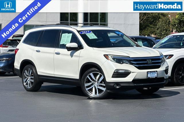 Photo of 2017 White Diamond Pearl Honda Pilot