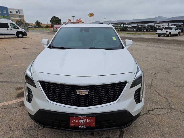 Photo of 2021 Crystal White Tricoat Cadillac XT4