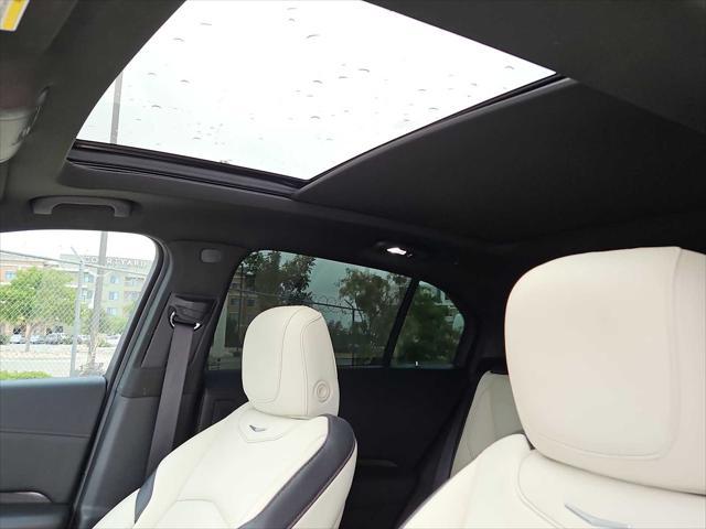 Photo of 2021 Crystal White Tricoat Cadillac XT4