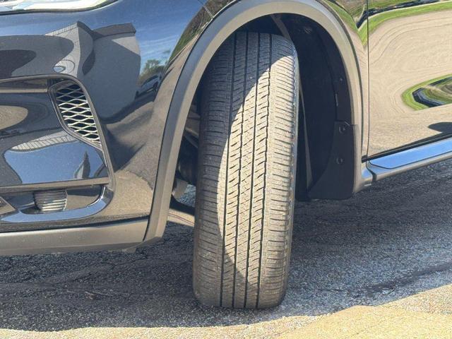 Photo of 2024 Black Obsidian INFINITI QX50