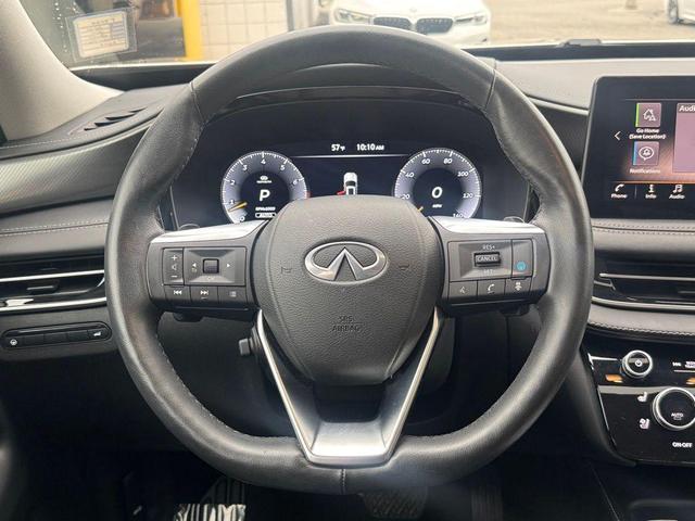 Photo of 2024 Warm Titanium INFINITI QX60