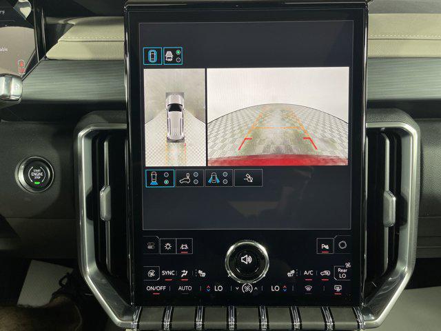 Photo of 2025 Volcanic Red Tintcoat GMC Acadia