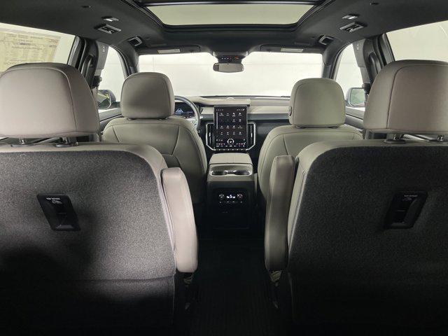 Photo of 2025 Volcanic Red Tintcoat GMC Acadia