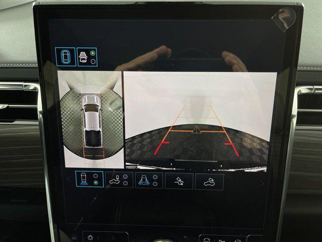 Photo of 2025 Summit White GMC Sierra EV