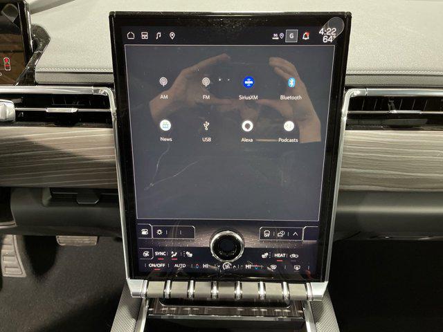 Photo of 2025 Summit White GMC Sierra EV