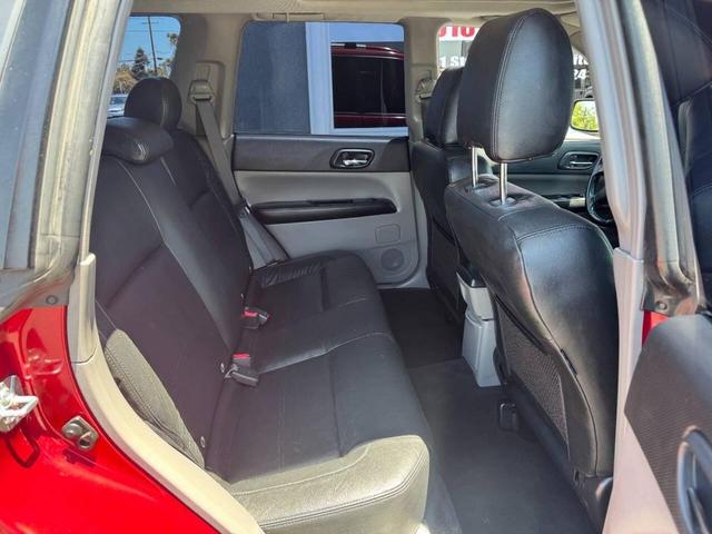 Photo of 2004 Red Subaru Forester