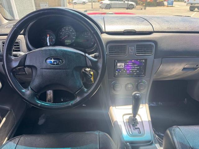Photo of 2004 Red Subaru Forester