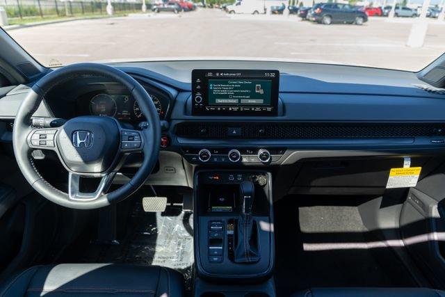 Photo of 2025 Platinum White Pearl Honda CR-V Hybrid