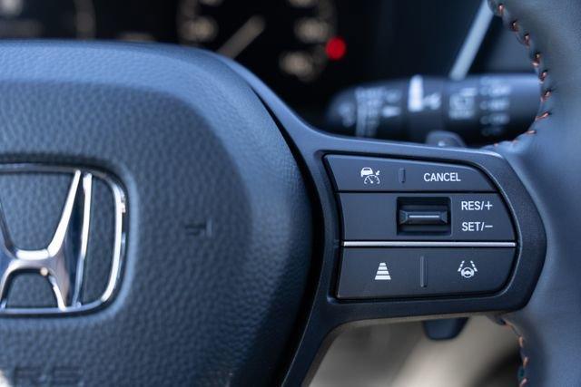 Photo of 2025 Platinum White Pearl Honda CR-V Hybrid