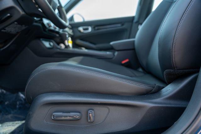 Photo of 2026 Blue Lagoon Pearl Honda Civic Hybrid