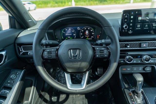 Photo of 2026 Blue Lagoon Pearl Honda Civic Hybrid