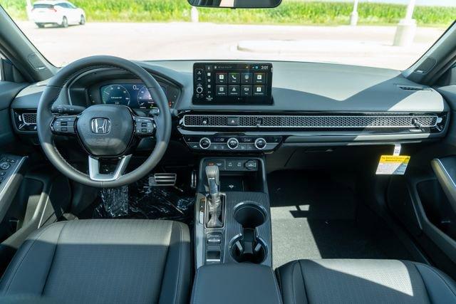 Photo of 2026 Blue Lagoon Pearl Honda Civic Hybrid