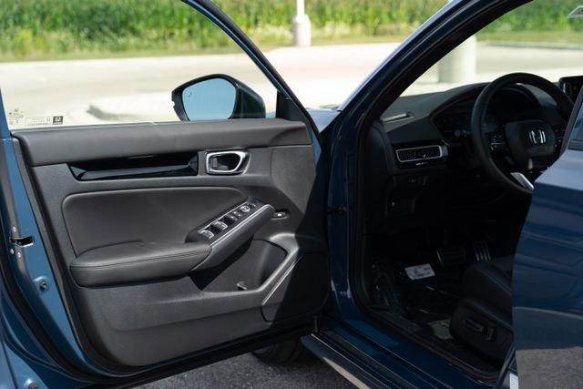 Photo of 2026 Blue Lagoon Pearl Honda Civic Hybrid