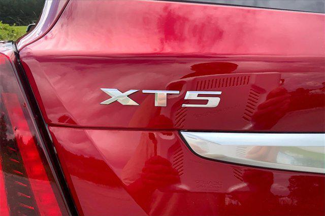 Photo of 2025 Radiant Red Tintcoat Cadillac XT5