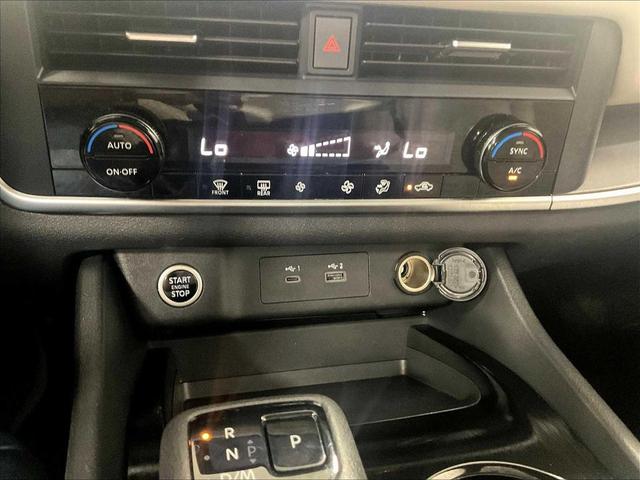 Photo of 2023 Pearl White Tricoat Nissan Rogue