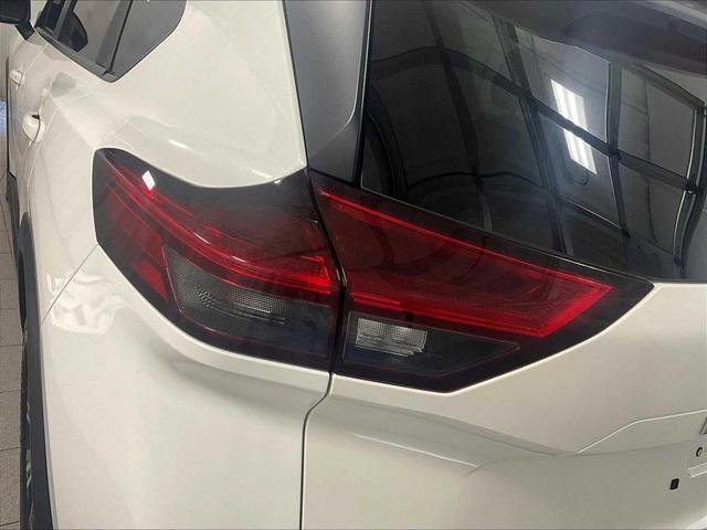 Photo of 2023 Pearl White Tricoat Nissan Rogue