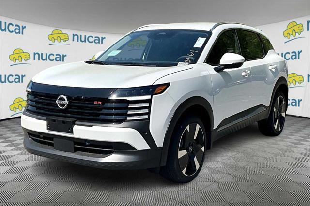 Photo of 2025 Aspen White Tricoat Nissan Kicks