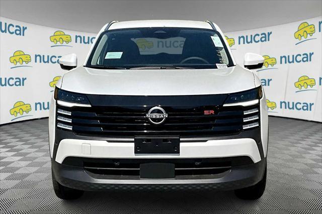 Photo of 2025 Aspen White Tricoat Nissan Kicks