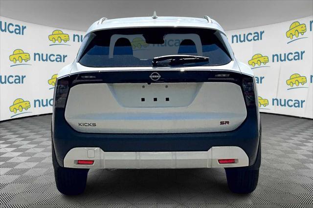 Photo of 2025 Aspen White Tricoat Nissan Kicks