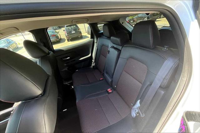 Photo of 2025 Aspen White Tricoat Nissan Kicks