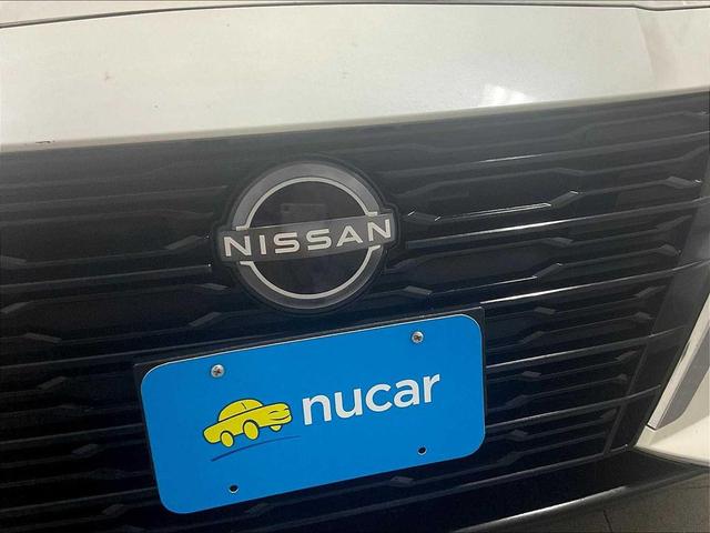 Photo of 2023 Pearl White Tricoat Nissan Altima