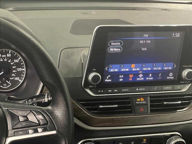 Photo of 2023 Pearl White Tricoat Nissan Altima