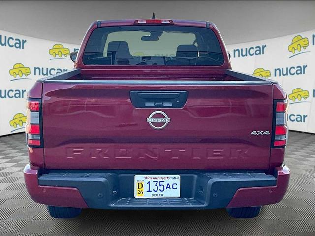 Photo of 2025 Cardinal Red Metallic Tricoat Nissan Frontier