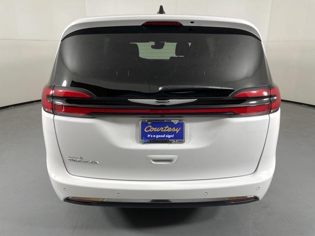 Photo of 2025 Bright White Clearcoat Chrysler Pacifica