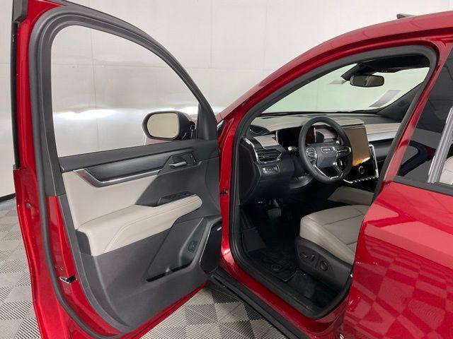 Photo of 2025 Volcanic Red Tintcoat GMC Acadia