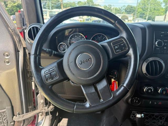 Photo of 2016 Granite Crystal Clearcoat Metallic Jeep Wrangler Unlimited