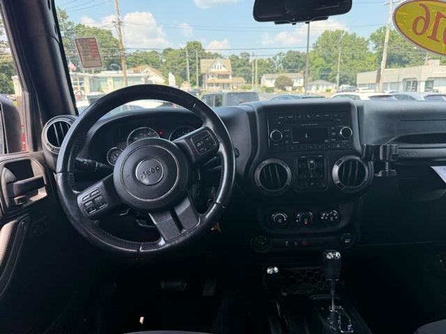 Photo of 2016 Granite Crystal Clearcoat Metallic Jeep Wrangler Unlimited