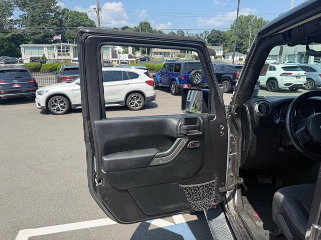 Photo of 2016 Granite Crystal Clearcoat Metallic Jeep Wrangler Unlimited