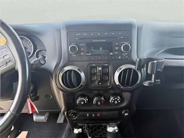 Photo of 2016 Granite Crystal Clearcoat Metallic Jeep Wrangler Unlimited