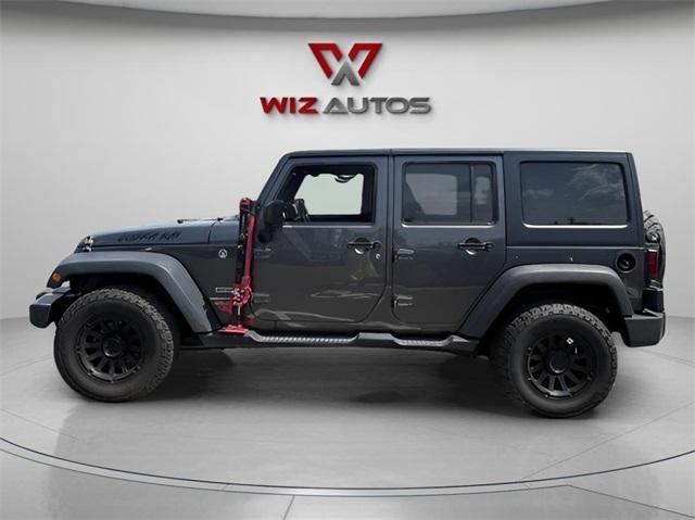 Photo of 2016 Granite Crystal Clearcoat Metallic Jeep Wrangler Unlimited