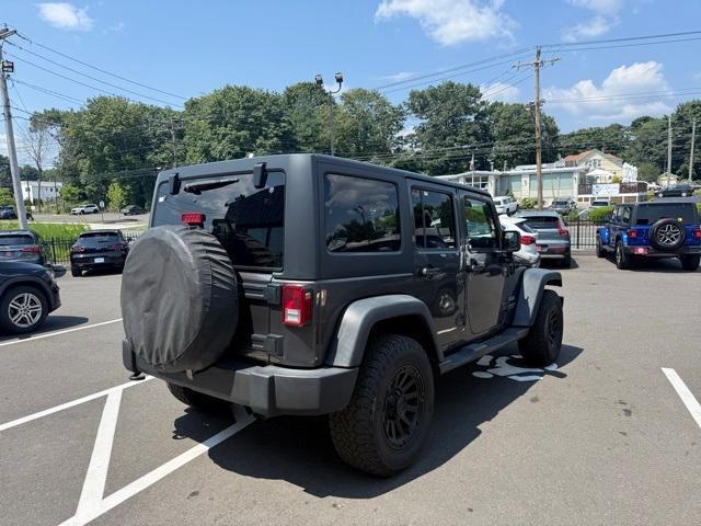 Photo of 2016 Granite Crystal Clearcoat Metallic Jeep Wrangler Unlimited