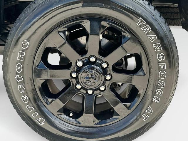 Photo of 2024 Diamond Black Crystal Pearlcoat RAM 2500