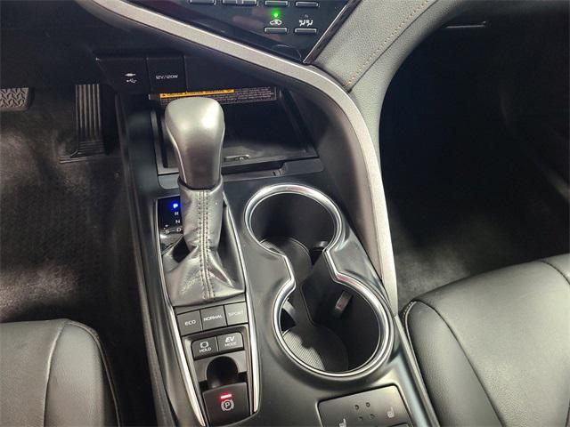 Photo of 2019 Brownstone Toyota Camry Hybrid