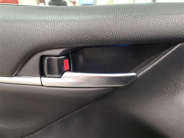 Photo of 2019 Brownstone Toyota Camry Hybrid
