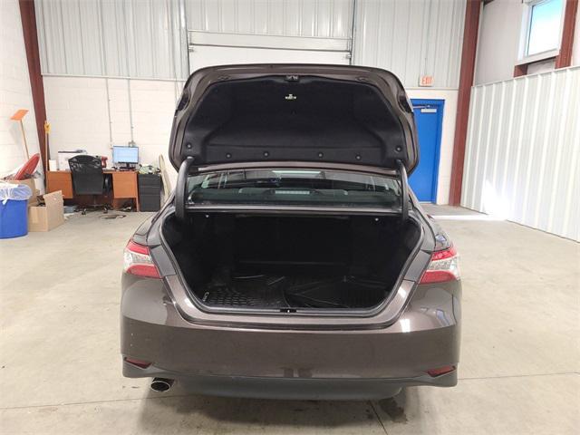 Photo of 2019 Brownstone Toyota Camry Hybrid
