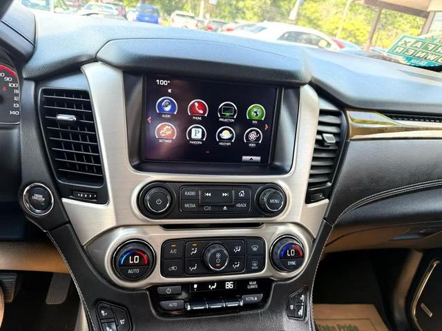 Photo of 2016 Dark Green GMC Yukon