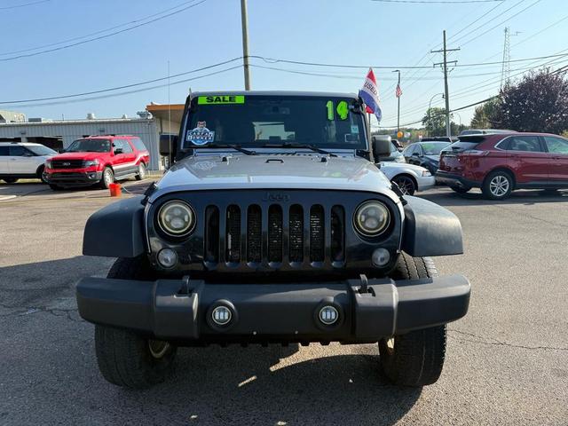 Photo of 2014 grey Jeep Wrangler Unlimited