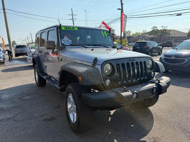 Photo of 2014 grey Jeep Wrangler Unlimited