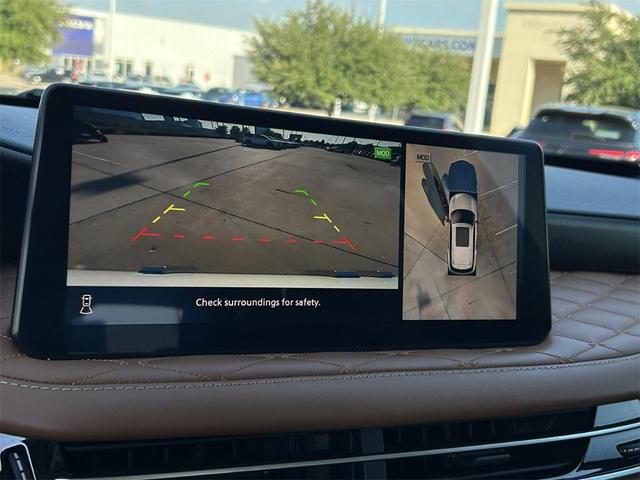 Photo of 2024 2t Mjst Whte INFINITI QX60